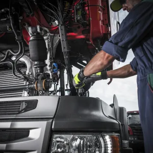 J&Z MAN Truck and Trailer Repairs (PTY) Ltd service van with technicians offering 24-hour roadside assistance under a starry sky.